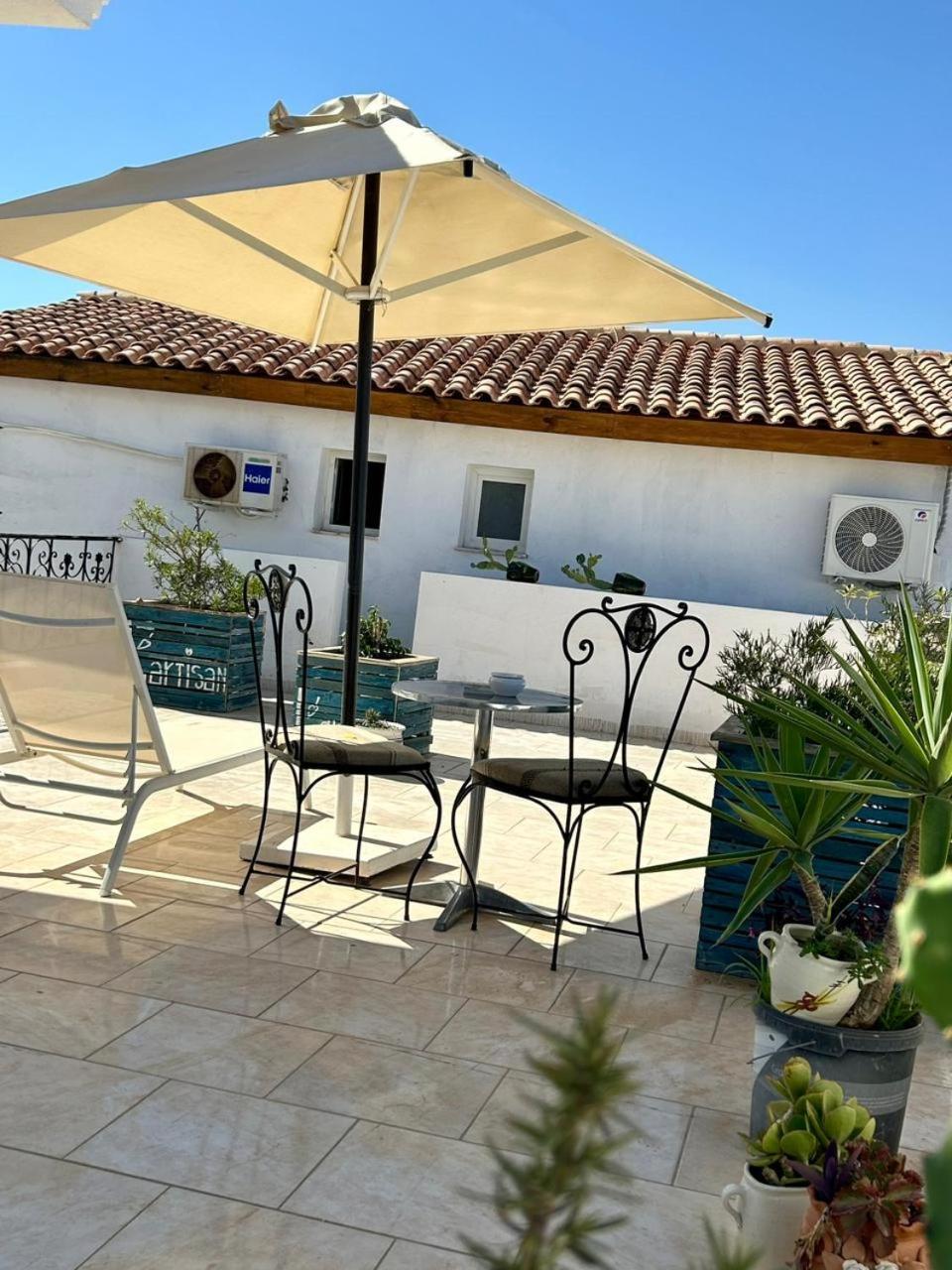 Hotel L'Artisan Harqalah Exterior foto